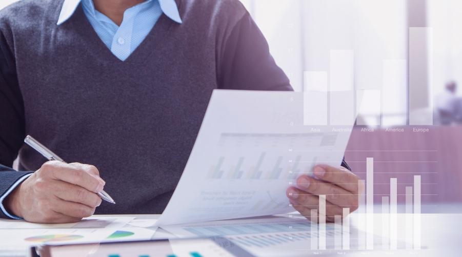 Image of business man analysing business reports