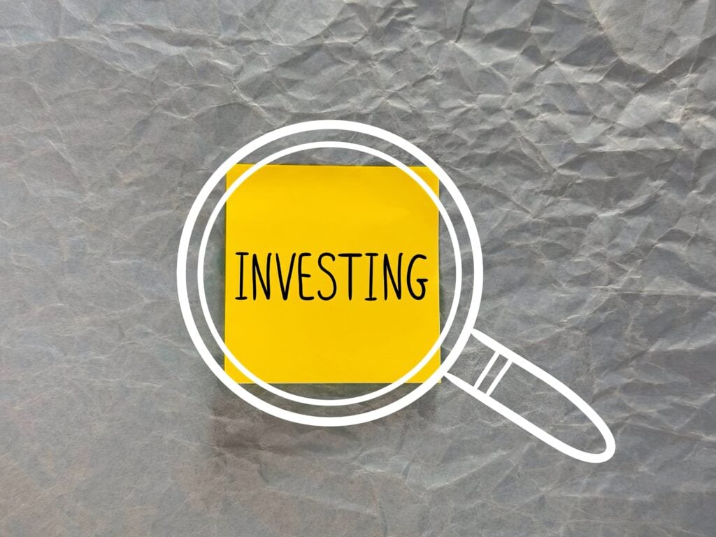 an investment in the future the inscription is an investment on office paper sticker on a paper background the investment plan a banner for a website about investments big profits