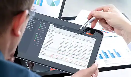 Business analytics dashboard showing financial data and charts at Brixx.